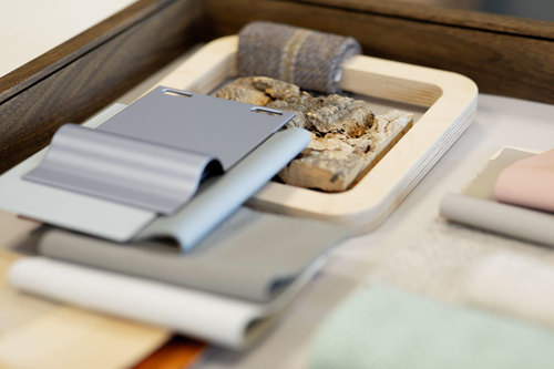 Moodboard with natural coloured leather and wood
